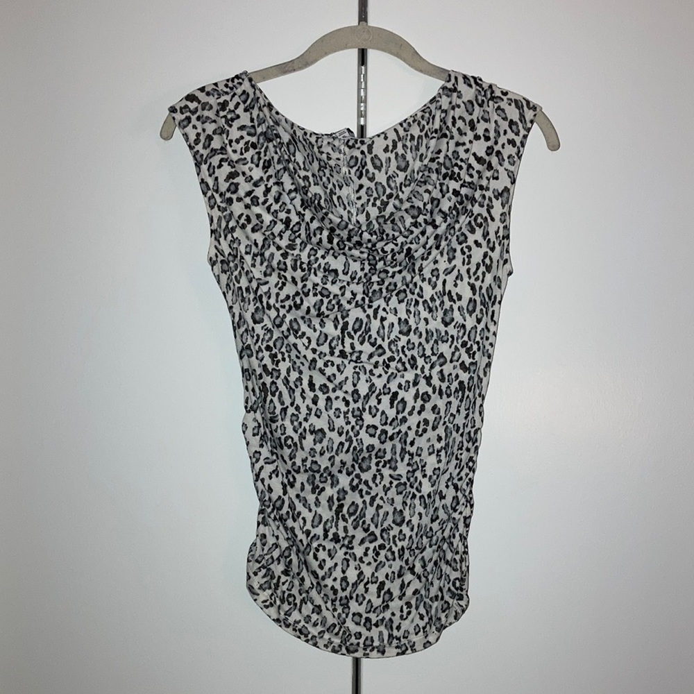 Animal print sleeveless top with rushing on the sides